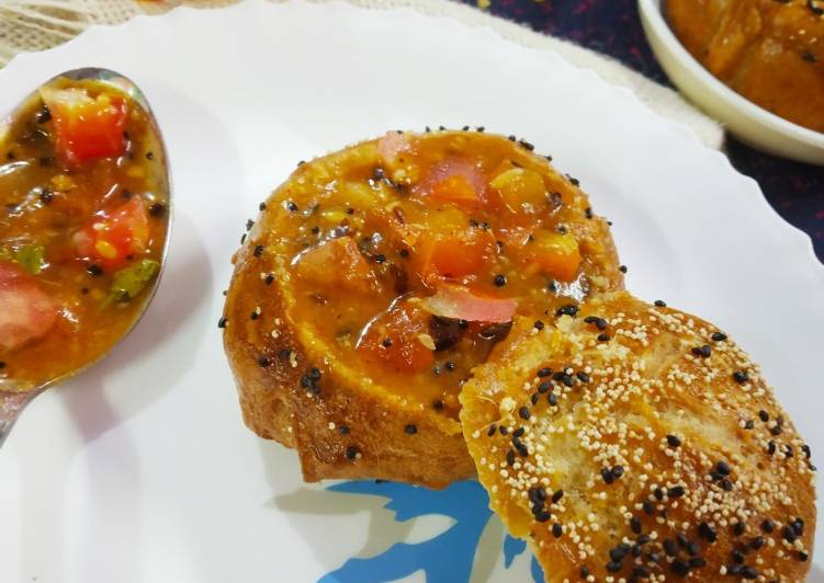 Pretzel bread buns filled tomato kootu
