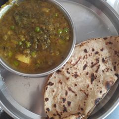 Green onion leaves, peas and potato curry A picture of Green onion leaves, peas and potato curry.
