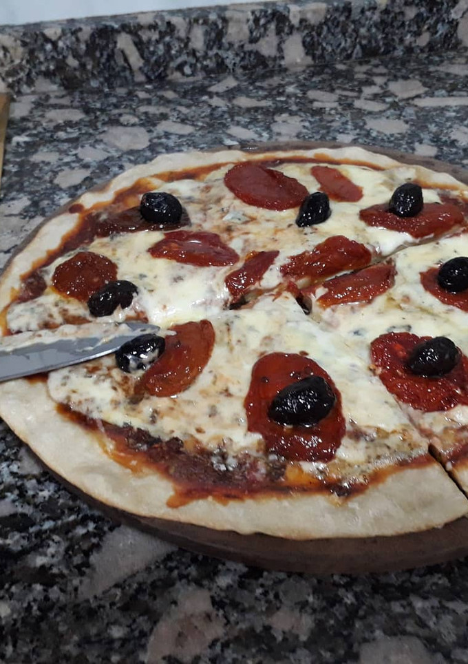 Una foto de Pizza de masa madre