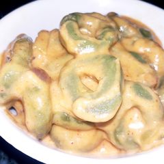 A picture of Homemade Spinach wheat flour white sauce pasta.