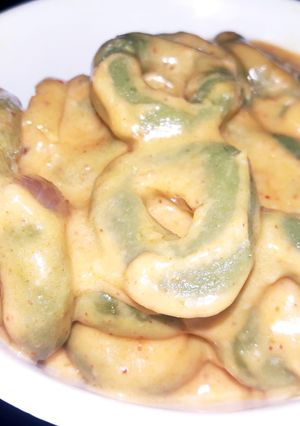 A picture of Homemade Spinach wheat flour white sauce pasta.