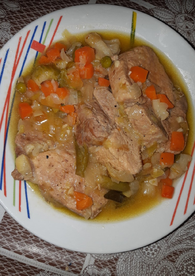 Una foto de Cinta de lomo de cerdo en salsa