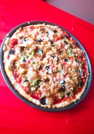 A picture of Beef Tikka pizza.
