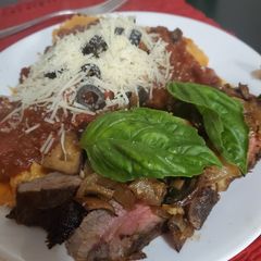 A picture of Brad's Marinated Flank Steak & Ravioli Marinara.