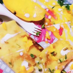 A picture of Sweet Creamy Mango Pancakes Rolls.