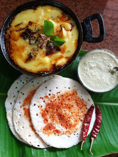 A picture of Potato stew with Chilli Dosa.