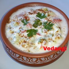 A picture of Cucumber & Tomato Raita.