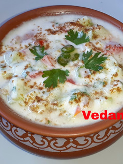 A picture of Cucumber & Tomato Raita.