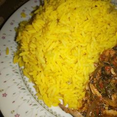 A picture of Curry rice and ugu stew.