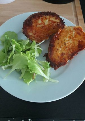A picture of Parmigiano baked potatoes.