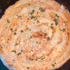 Andhra spicy egg dosa A picture of Andhra spicy egg dosa.