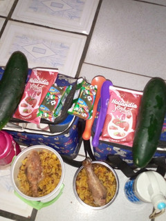 A picture of Rice and Beans with chicken.