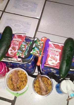 A picture of Rice and Beans with chicken.