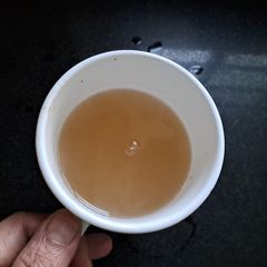 A picture of Amla powder tea / Gooseberry tea.