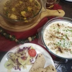 Aalu qeema with dahi phulki A picture of Aalu qeema with dahi phulki.