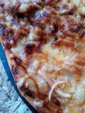 Pizza bolognese y prosciutto