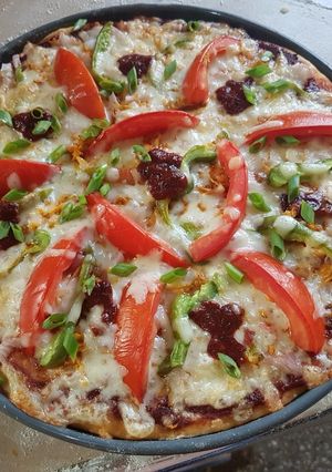 Una foto de Pizza vegetariana