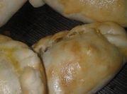 Una foto de empanada de osobuco