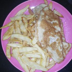 Fried chips and egg A picture of Fried chips and egg.
