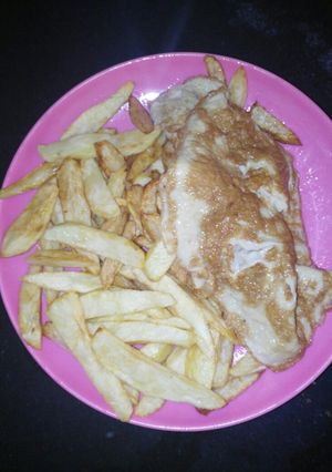A picture of Fried chips and egg.