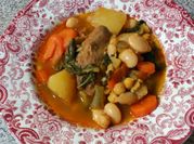 Una foto de garbanzos con habichuelas y calabaza