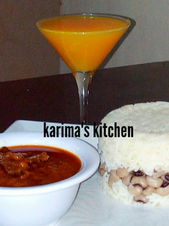 A picture of Rice and beans/dry fish stew.