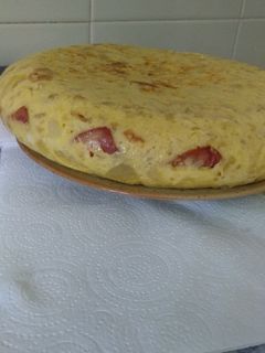 Una foto de Tortilla de bacon y queso