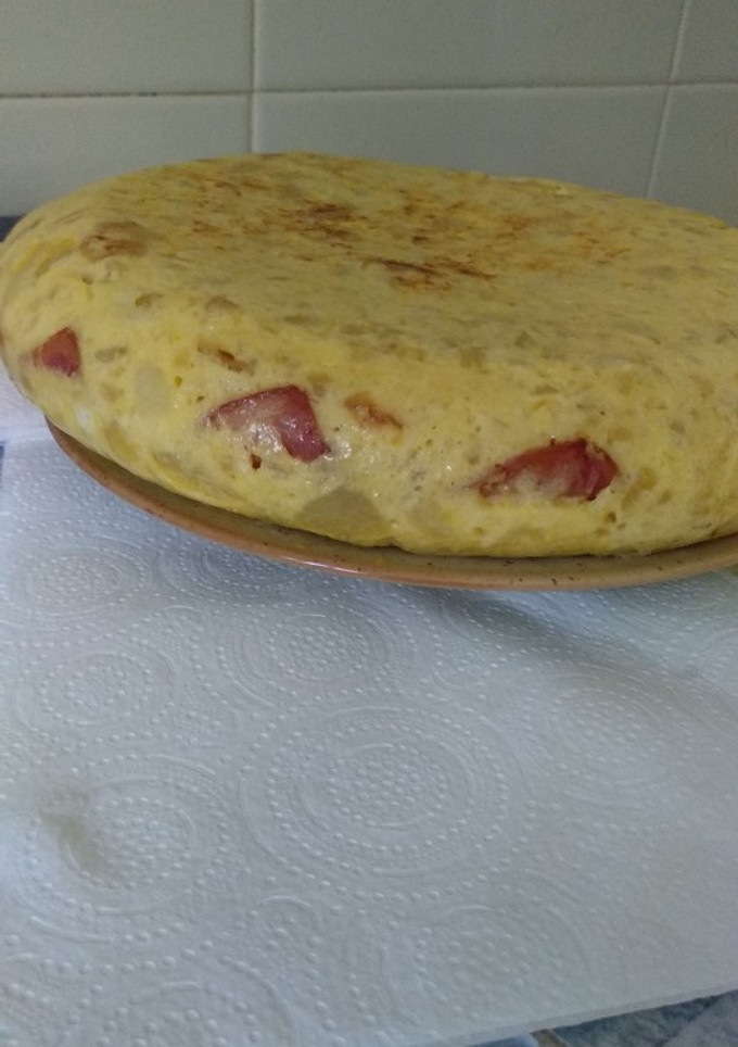 Una foto de Tortilla de bacon y queso