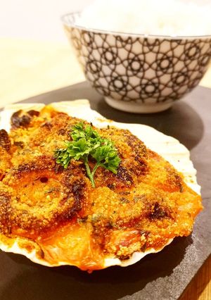 Une photo de Coquilles de la mer gratinées