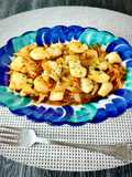 Calamares encebollados con sobrasada