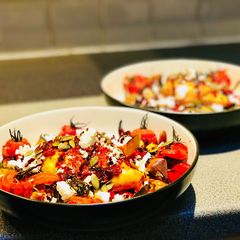A picture of Mediterranean roast chicken and vegetables with cous cous!.