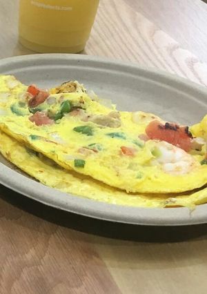 A picture of Egg and shrimp veggies.