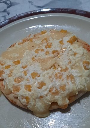 Una foto de Pizza con choclo