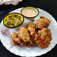 A picture of Vegetable egg pakoda.