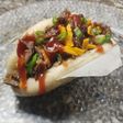 Roast beef desmechado con panceta y cebolla caramelizada, en pan bao (pancitos al vapor)