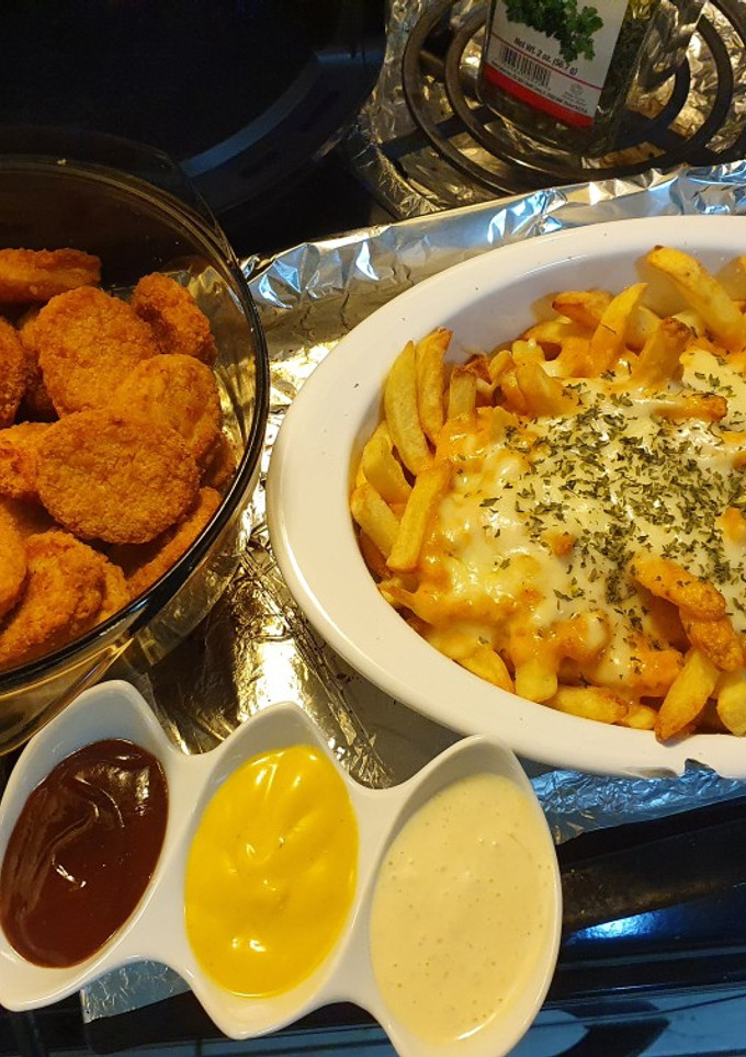 Una foto de Papitas y nuggets sin grasa, un antojito de Domingo