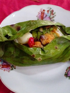 A picture of Grilled rice in banana leaves #Asia food.