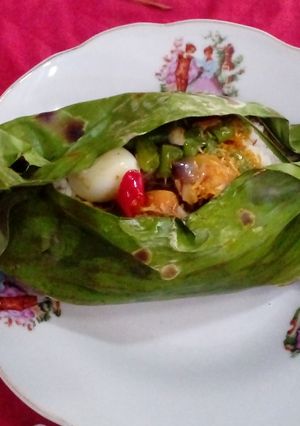 A picture of Grilled rice in banana leaves #Asia food.
