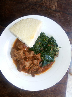 A picture of Beef stew Ugali and Cowpeasleaves.