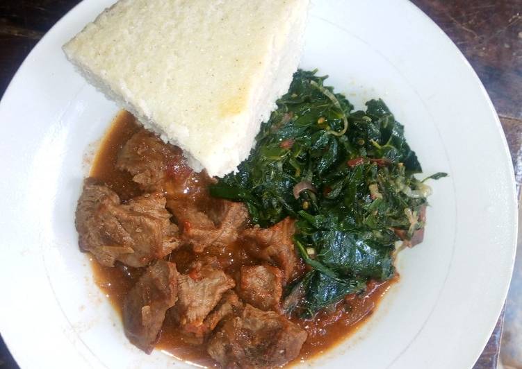Beef stew Ugali and Cowpeasleaves