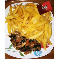 Irish potatoes with vegetable sauce A picture of Irish potatoes with vegetable sauce.