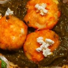 A picture of Palak Aloo with onion Rice.