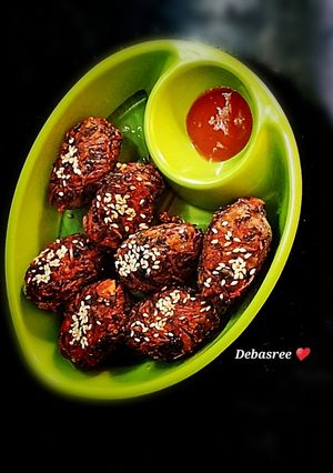 A picture of Red amaranth Pakora with Sesame Seeds.