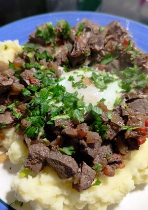 Una foto de Hígado encebollado