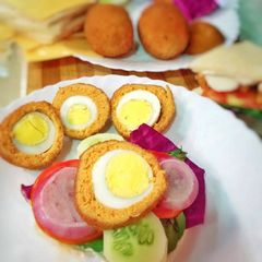 A picture of Scotch Egg Burger.