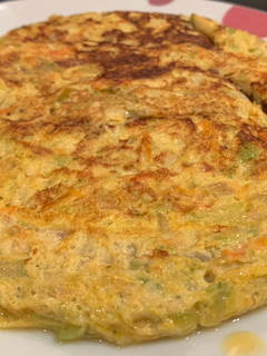 Una foto de Mini Tortilla de calabacín, zanahoria y cebolla