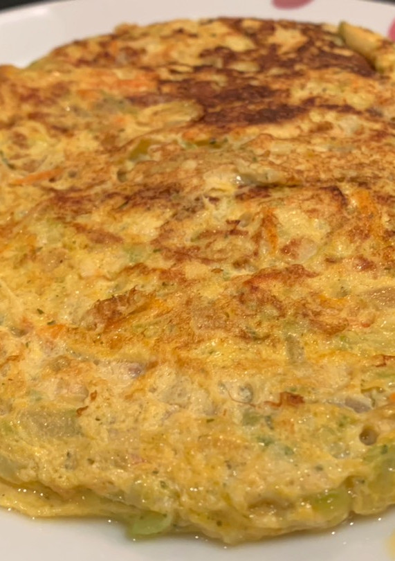 Una foto de Mini Tortilla de calabacín, zanahoria y cebolla