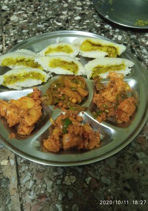 A picture of Steamed stuffed idli.
