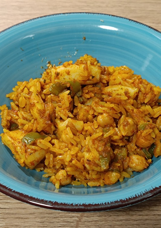 Una foto de Arroz con sepia y garbanzos