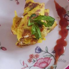 A picture of Moong chilla panir roll.
